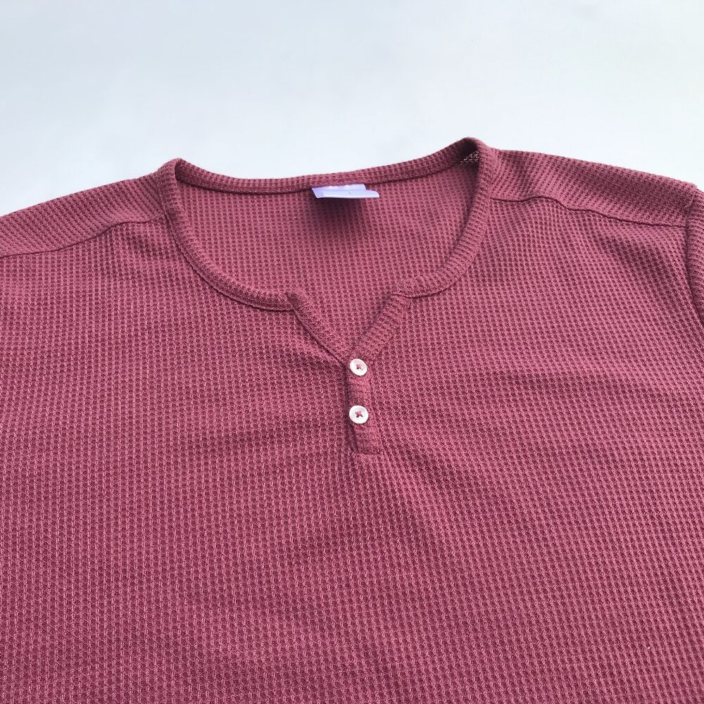 Man top by HANGTEN. New.  Short sleeves, stratchable. Medium - Large